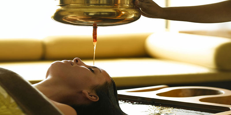 Traditional Ayurvedic Massage Therapy experienced by young lady.