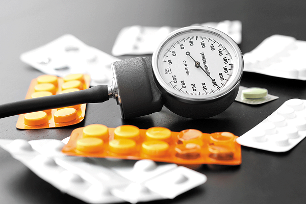 Antibiotics & Pressure Checker Placed On The Table.