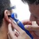 An ENT Specialist Checking A Patient's Ear.