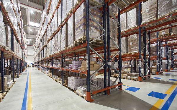 Medicines stacked in racks in a warehouse.